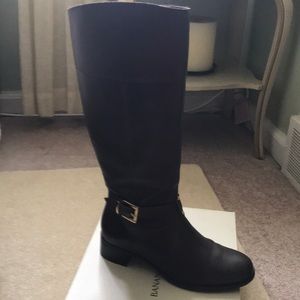 Tall brown riding boots